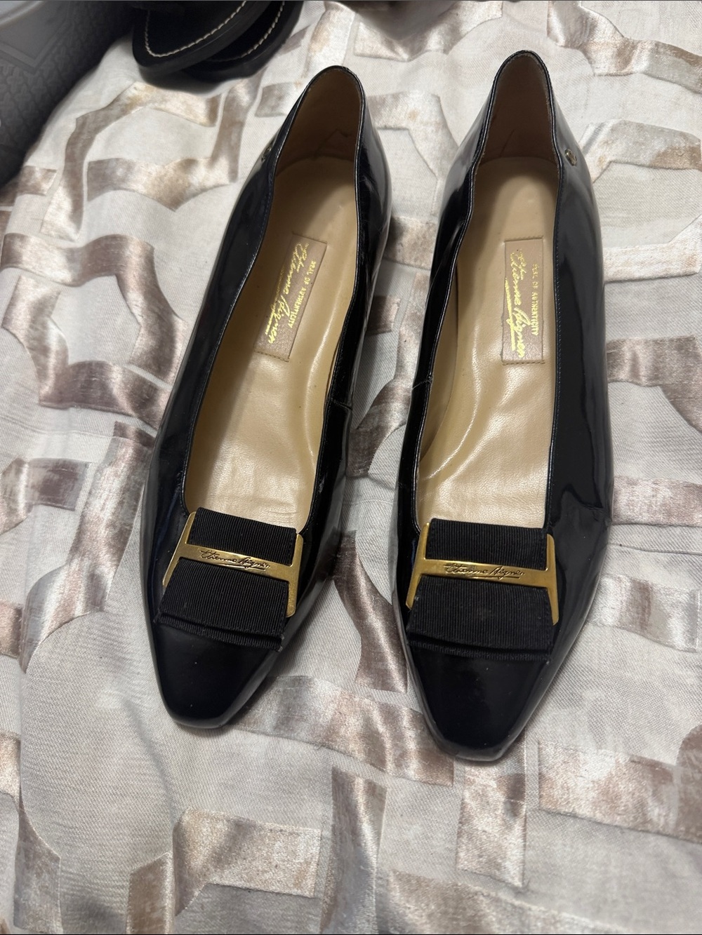 Salvatore Ferragamo Black Patent Vara Bow Flats with Gold Plaque
